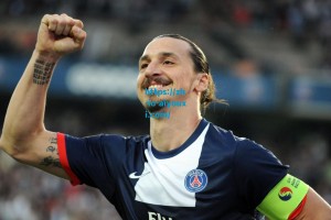 爱游戏下载：国安登顶积分榜，万千球迷共铸辉煌！下一站，大连梭鱼湾再续征程